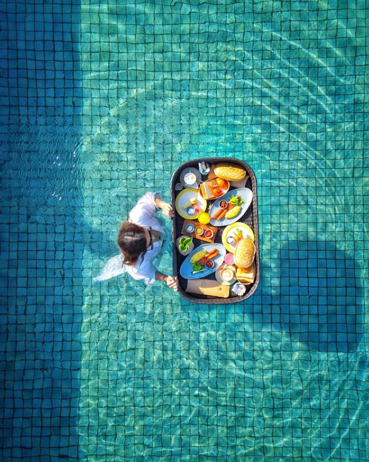 特拉帕拉纳比斯马酒店-Chse认证 乌布 外观 照片 Floating breakfast at Four Seasons Resort, Maldives